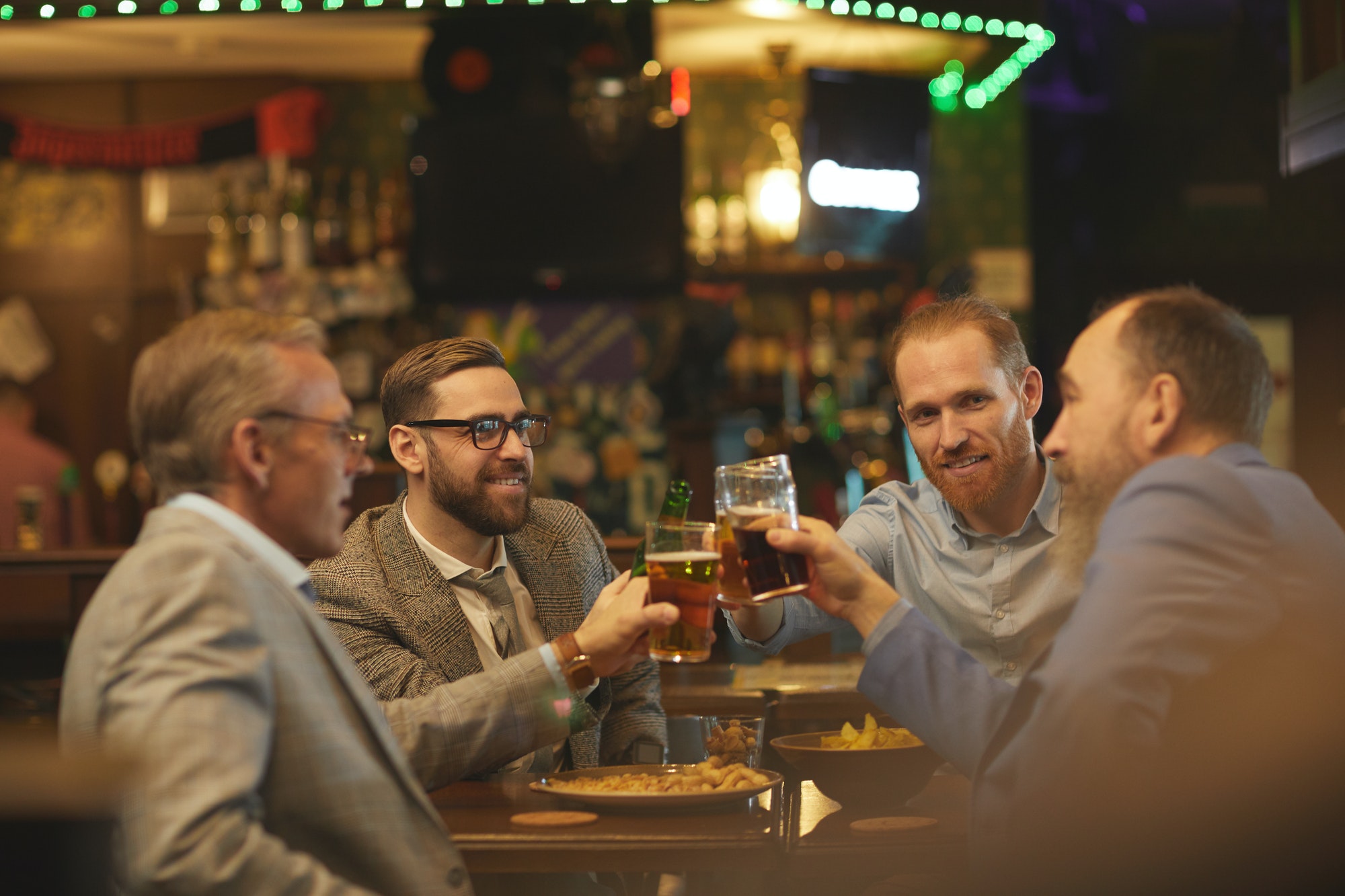 Men with drinks in the pub
